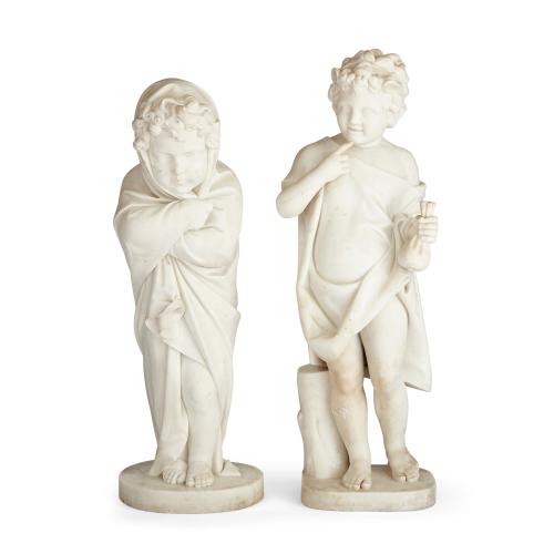 Near pair of large Italian Carrara marble putti sculptures