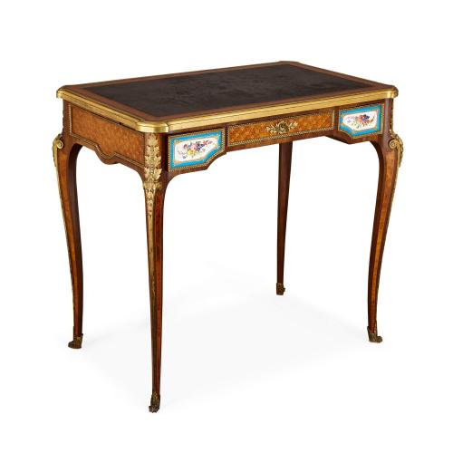 Very fine ormolu and porcelain mounted marquetry desk by Dasson