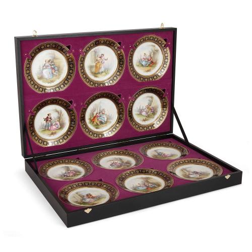 Sèvres porcelain set of 12 handpainted plates in fitted case