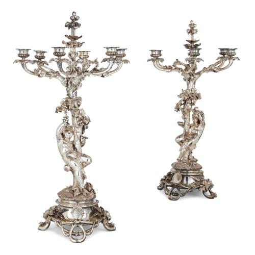 Pair of six-light silvered bronze candelabra by Christofle