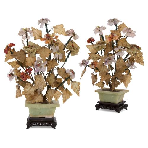 Pair of Chinese hardstone flower models with ebonised wood bases