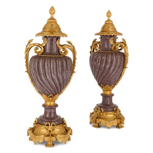 Pair of French Neoclassical style porphyry vases with ormolu mounts