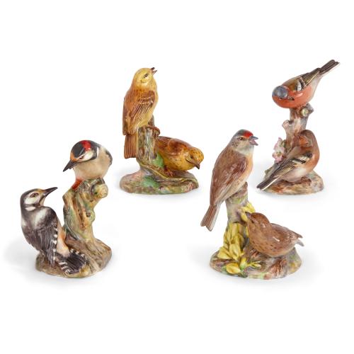 Collection of four Royal Worcester porcelain double bird models 