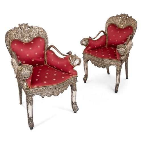 Pair of antique Indian repoussé silver chairs 