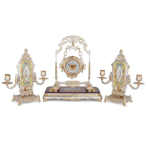 Japonisme silvered bronze and porcelain three-piece clock garniture