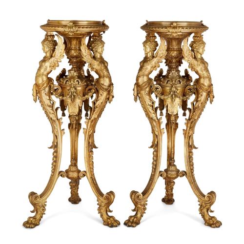 Pair of antique gilt-bronze Neo-Grec sphinx tripod stands