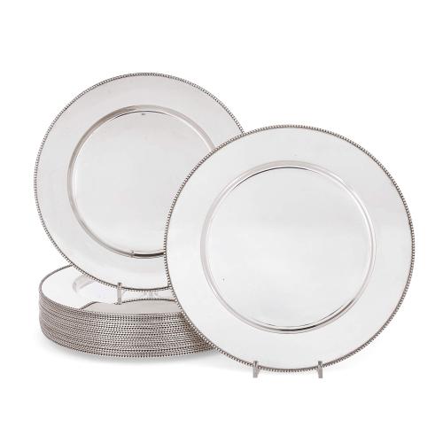 Set of 24 silver charger plates 
