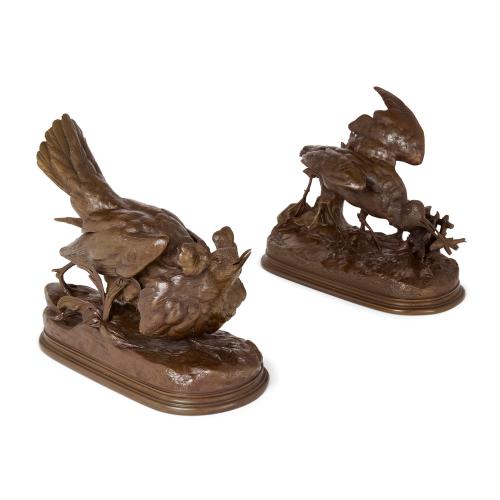 Pair of antique patinated bronze bird sculptures by Moigniez