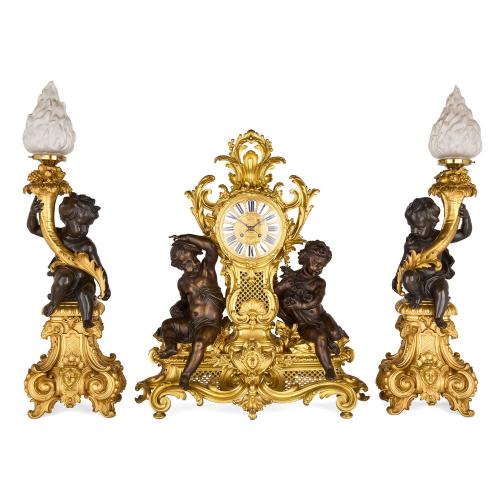 Very large antique Louis XV style gilt and patinated bronze clock set