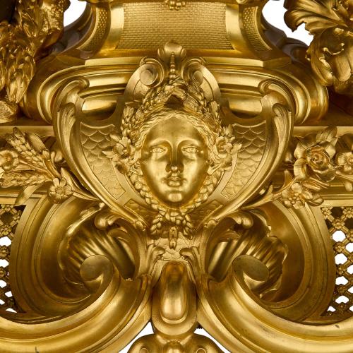 Very large antique Louis XV style gilt and patinated bronze clock