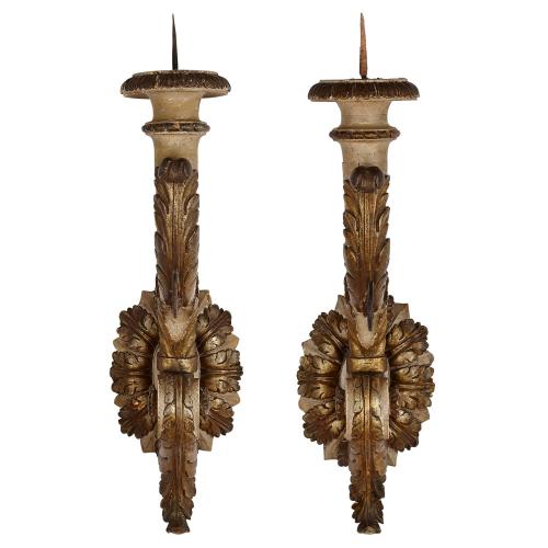 Pair of Italian parcel-gilt and painted carved wood wall lights