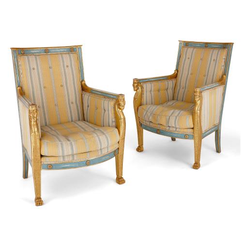 Pair of French painted giltwood Empire style armchairs