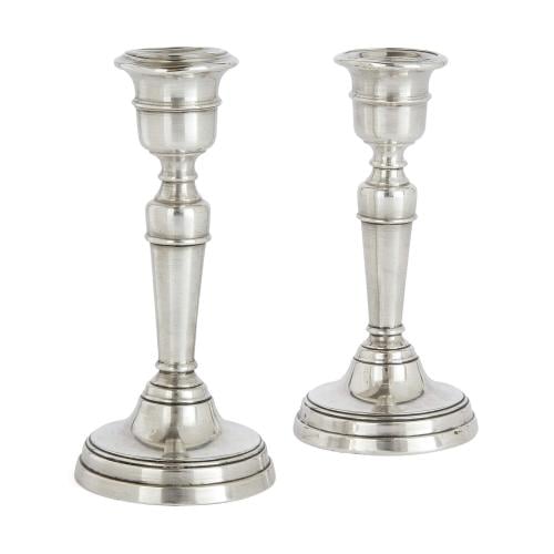 Pair of antique English silver candlesticks by Edward Barnard & Sons