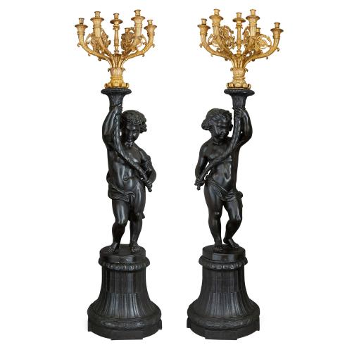 Pair of large cast iron and ormolu seven-light candelabra