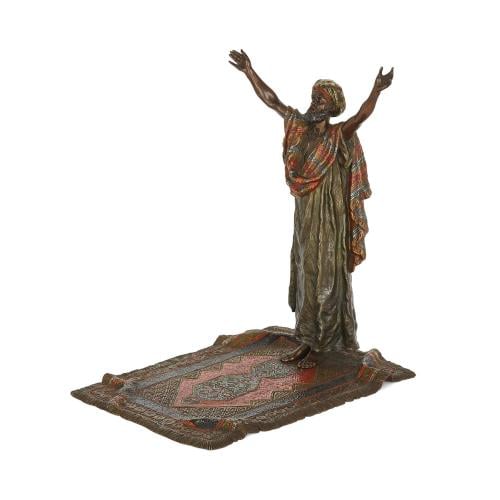 Viennese cold-painted bronze group of man praying