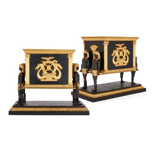 Pair of large Empire style gilt and patinated bronze planters