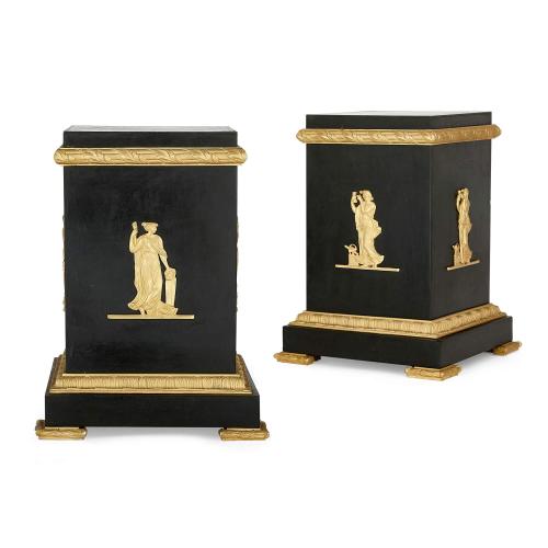 Pair of Empire-style French gilt and patinated bronze stands
