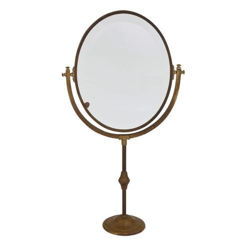 Large brass table mirror on swivel stand