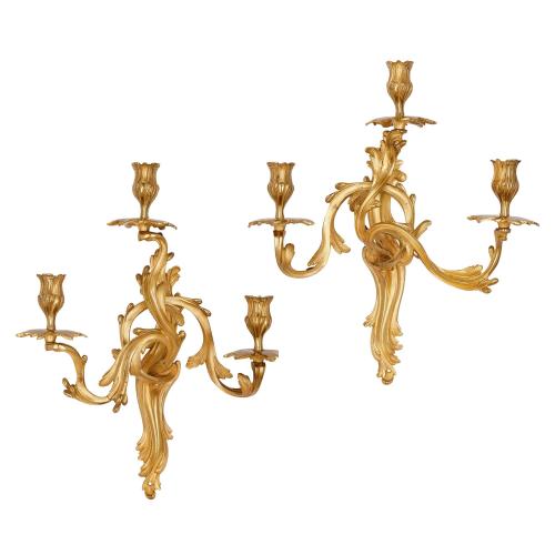 Pair of French gilt-bronze Louis XV style wall lights