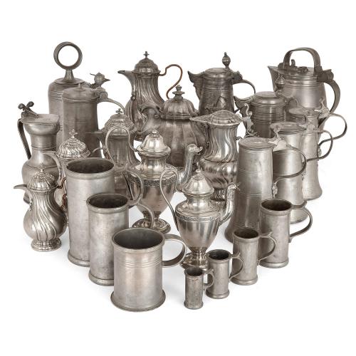Eclectic collection of pewter tankards and ewers