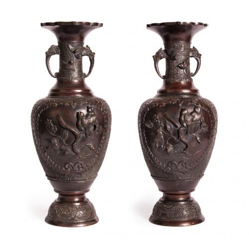 Pair of antique Tibetan bronze vases