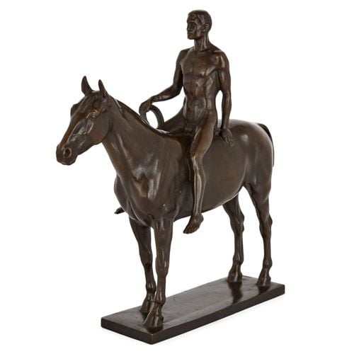Bronze horse and rider sculpture by Splieth