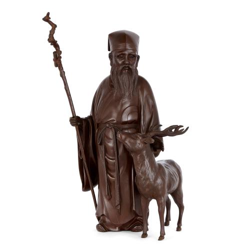 Bronze Meiji figure of Jurōjin, God of Longevity, with deer and staff