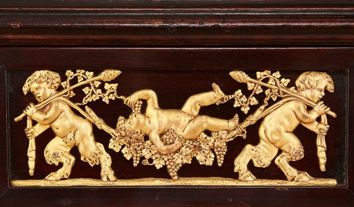 Ormolu mounted satyrs on neoclassical table